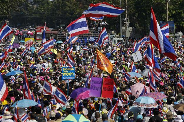 Opposition protesters march through Thai capital