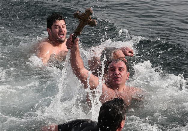 Greek Orthodox observe Epiphany with cross dive in Istanbul