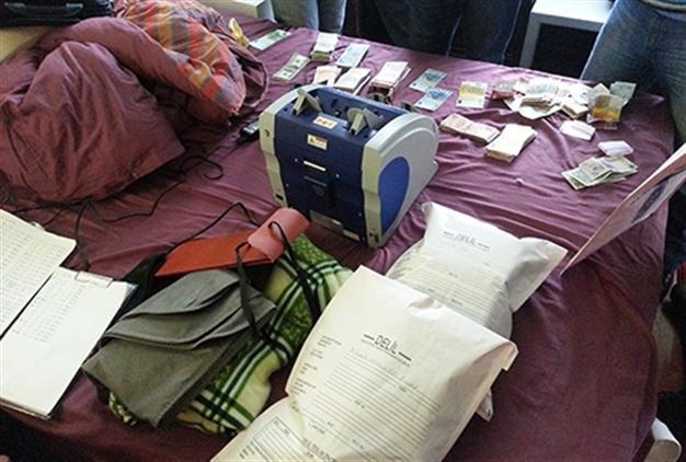 Photos of alleged bribery money seized in house of Turkish minister’s son revealed