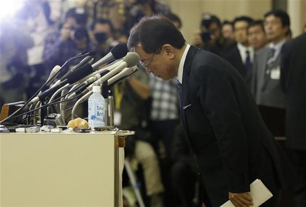 Tokyo governor who helped get Olympics resigns in money scandal