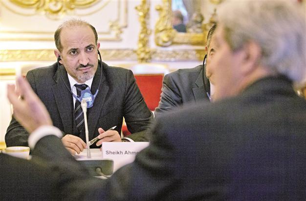 Syrian opposition divided over joining Geneva meet