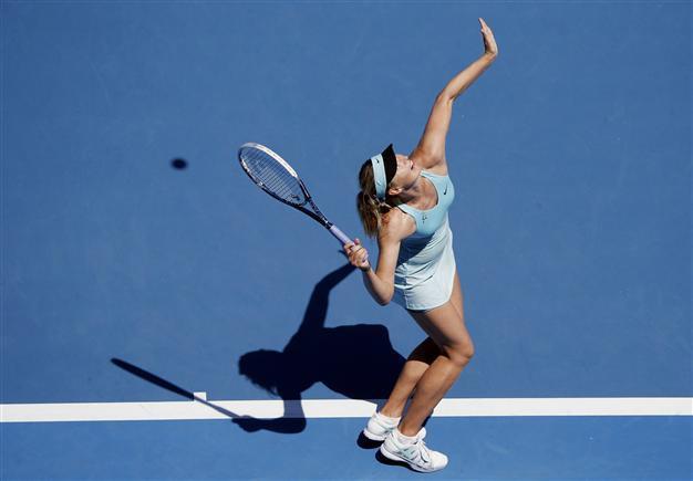 Sharapova, Wozniacki wobble but stay alive