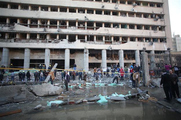 Suicide car bomber kills four in Cairo, two more blasts follow