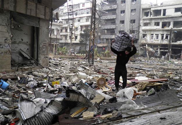 Syrian government under pressure to allow aid convoy