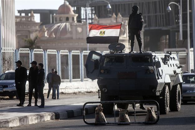 Egypts Morsi back on trial, police general shot dead