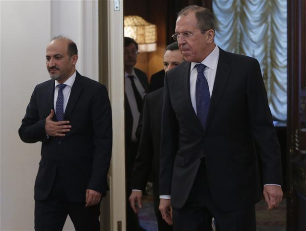 Syrian opposition chief presses Russia on al-Assad