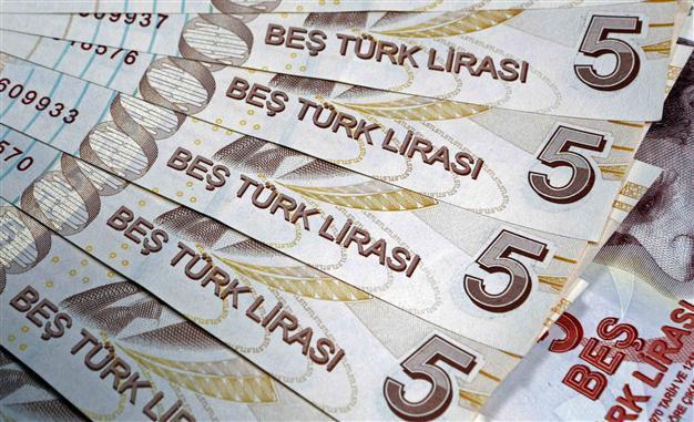 Turkey holds main interest rates steady as lira firms