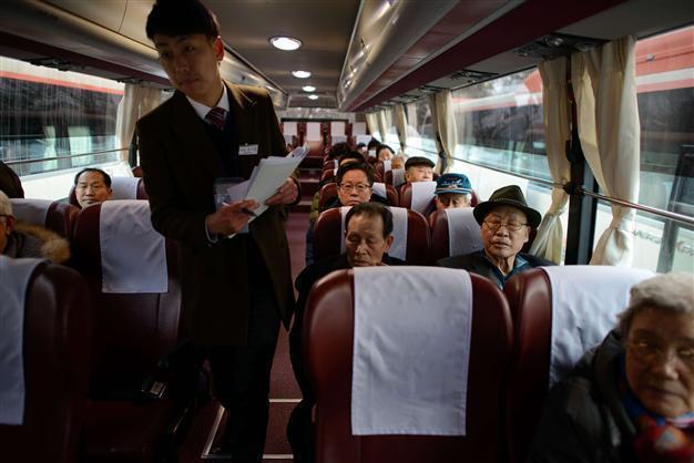 Divided Koreans hold bitter-sweet family reunion