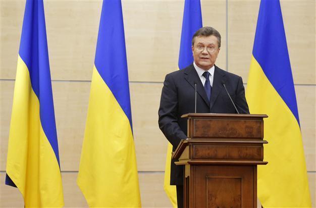 Yanukovych says still president, expects return to Kiev