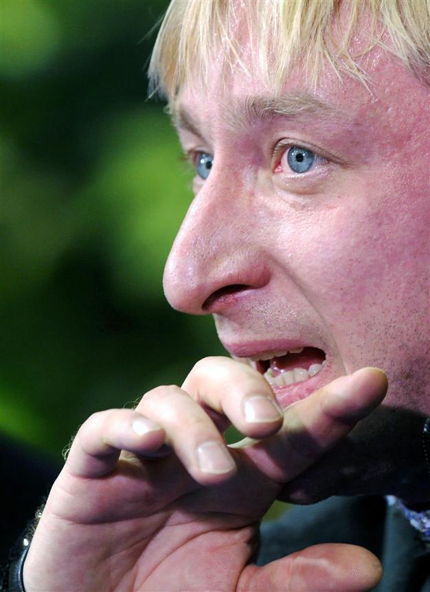 Plushenko out of Olympic individual event