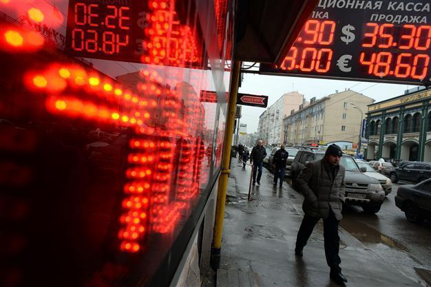 Russian central bank hikes rates as ruble plunges over Ukraine crisis