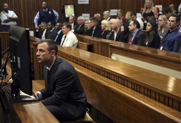 Pistorius pleads not guilty as witness describes terrible screams