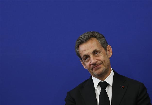 Frances Hollande, Sarkozy spar over Stasi wiretapping