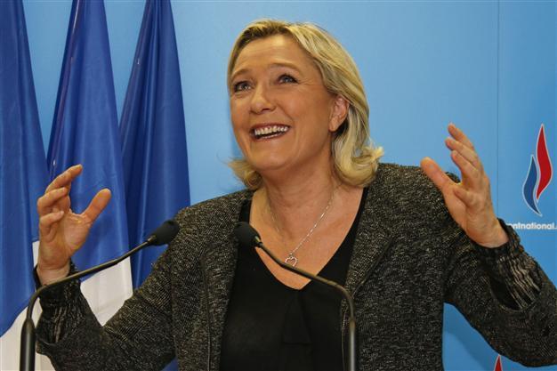 French far-right triumphs in local polls that hammer ruling Socialists