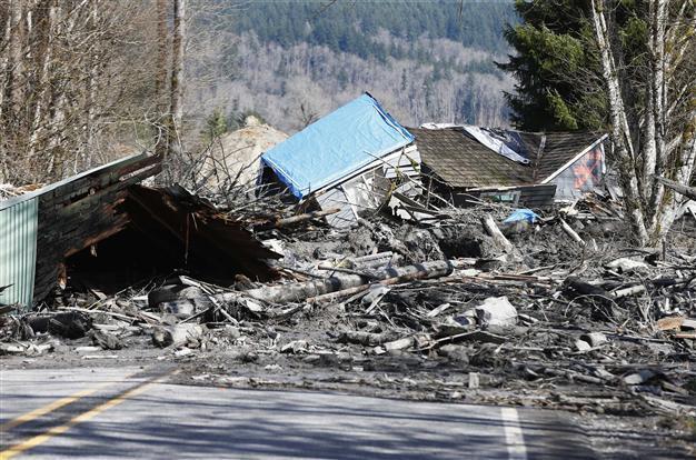 Eight killed, 18 missing in massive US landslide