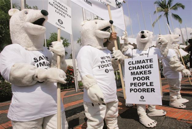 Top scientists reveal big climate report: Polar bear is us