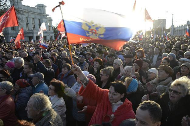 NATO announces review of cooperation with Russia as EU freezes assets of ousted leader