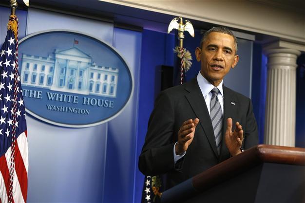 Obama warns Putin on Crimea, orders sanctions over Russian moves in Ukraine