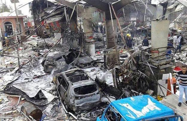 Suicide bomber kills 34 in Iraq as PM accuses Saudi Arabia and Qatar of fuelling bloodshed