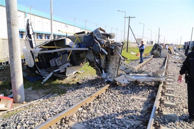 Ten killed as commuter train crashes into shuttle bus in southern Turkey