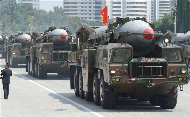 North Korea test-fires missiles as Obama hosts summit