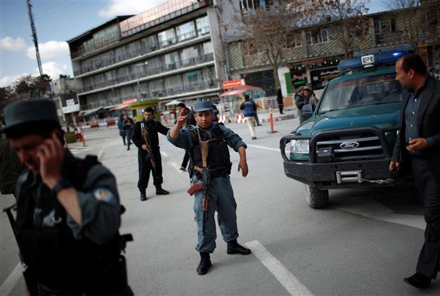 Suicide bomber kills 6 police at Afghan ministry ahead of vote
