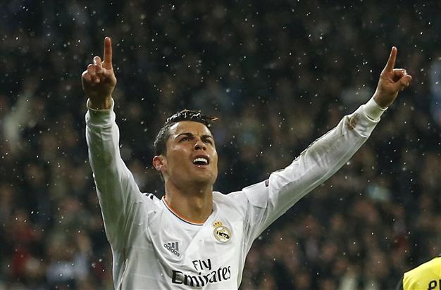 Ronaldo equals record as Real and PSG win