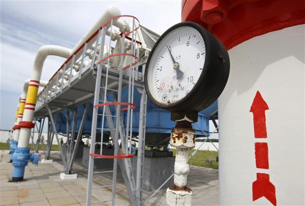 Russia hikes gas prices for Ukraine, squeezes fragile economy