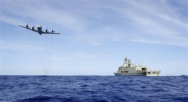 Malaysia says no mid-flight phone call from MH370 cockpit