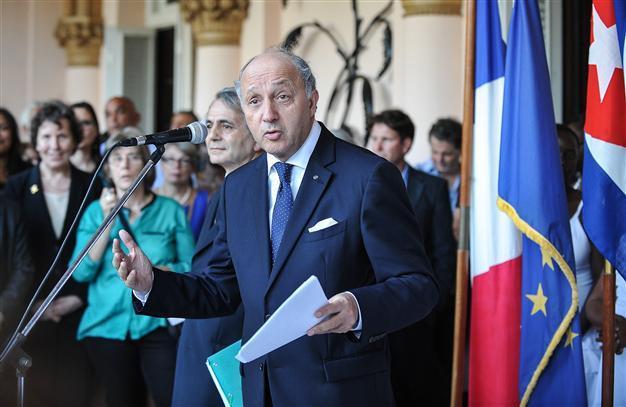 French foreign minister meets Raul Castro on historic visit to Cuba