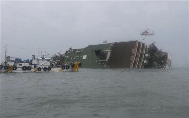 Fears grow for hundreds missing in South Korean ferry capsize as nine confirmed dead