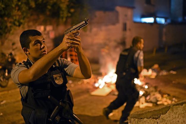 One dead as violent protests erupt in Rio