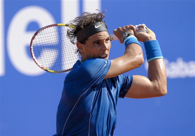 Nadal wins but Ferrer crashes out in Barcelona