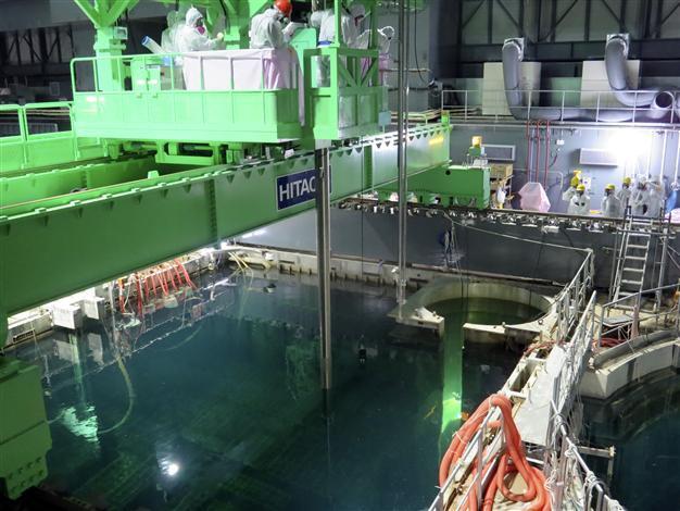 Japan researchers use cosmic rays to see nuclear fuel