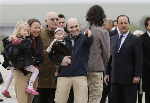 From Turkey-Syria border, to Paris: French journalists arrive home after hostage ordeal