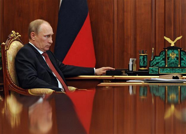 Putin signs law banning denial of Nazi war crimes