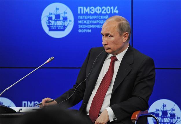 Putin vows to respect Ukraine vote but warns of civil war