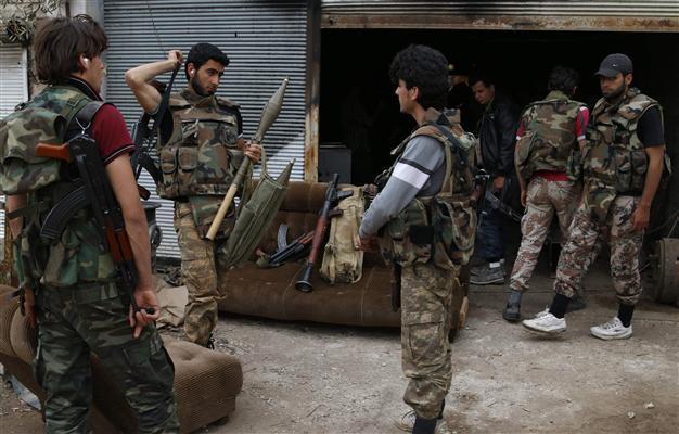 Syria rebels to free 1,500 families for food, prisoners: report