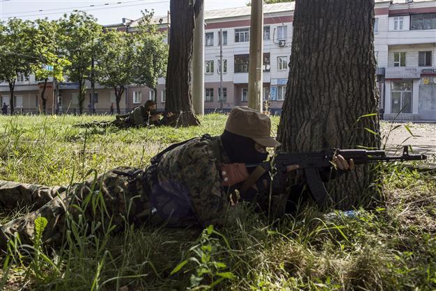 Ukraine rebels down army helicopter, killing 12 troops