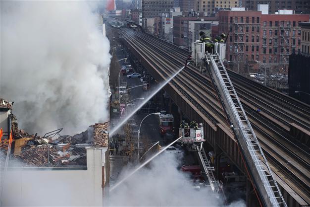 Three dead, 63 hurt as New York buildings collapse