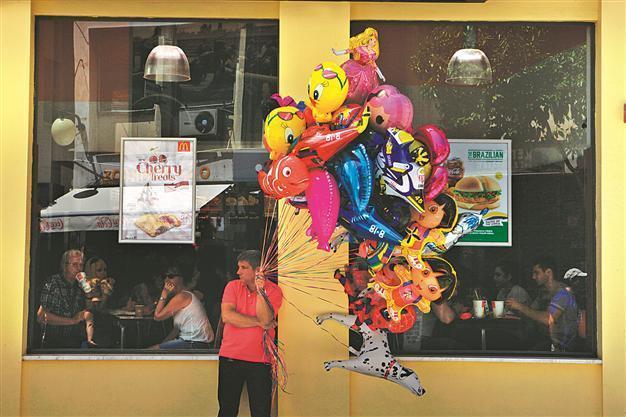 Greek Cyprus lenders expect shallower recession