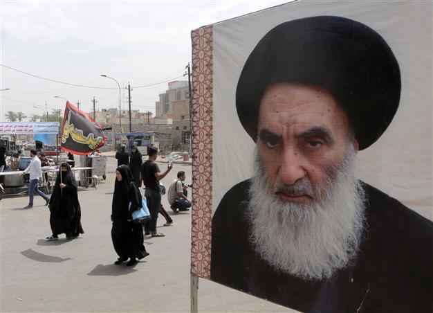 Top Shiite cleric urges Iraqis to take up arms against advancing militants