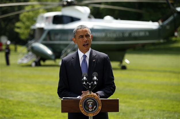 Obama says to take several days to decide how to help fight Iraq insurgency