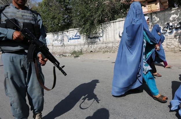 Afghans vote again in final test as Taliban threats loom