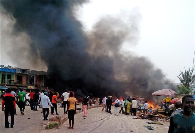 Twin Nigeria car bombs kill at least 118