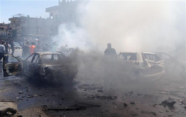 Car bomb kills 10 people in Syrias Homs: state media
