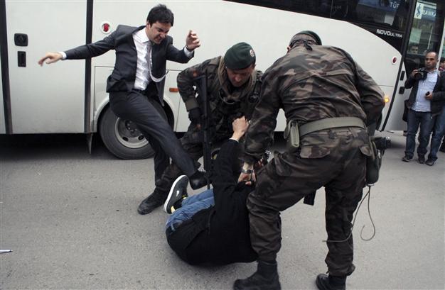 Turkish PMs aide who kicked mourner in Soma saved by lapse of time