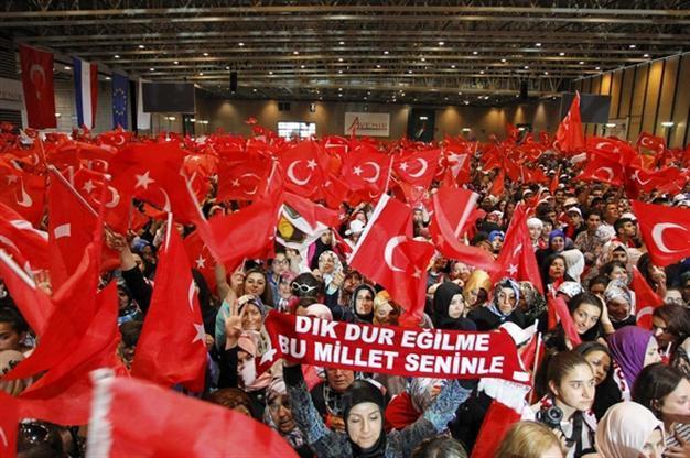 Thousands rally for Turkish PM in France, hundreds protest