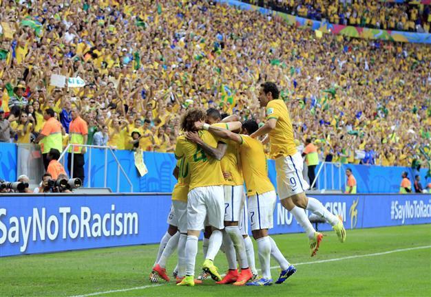 Brazil, Netherlands claim top spots in World Cup group deciders