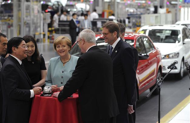 Germanys Merkel arrives in China with trade topping agenda